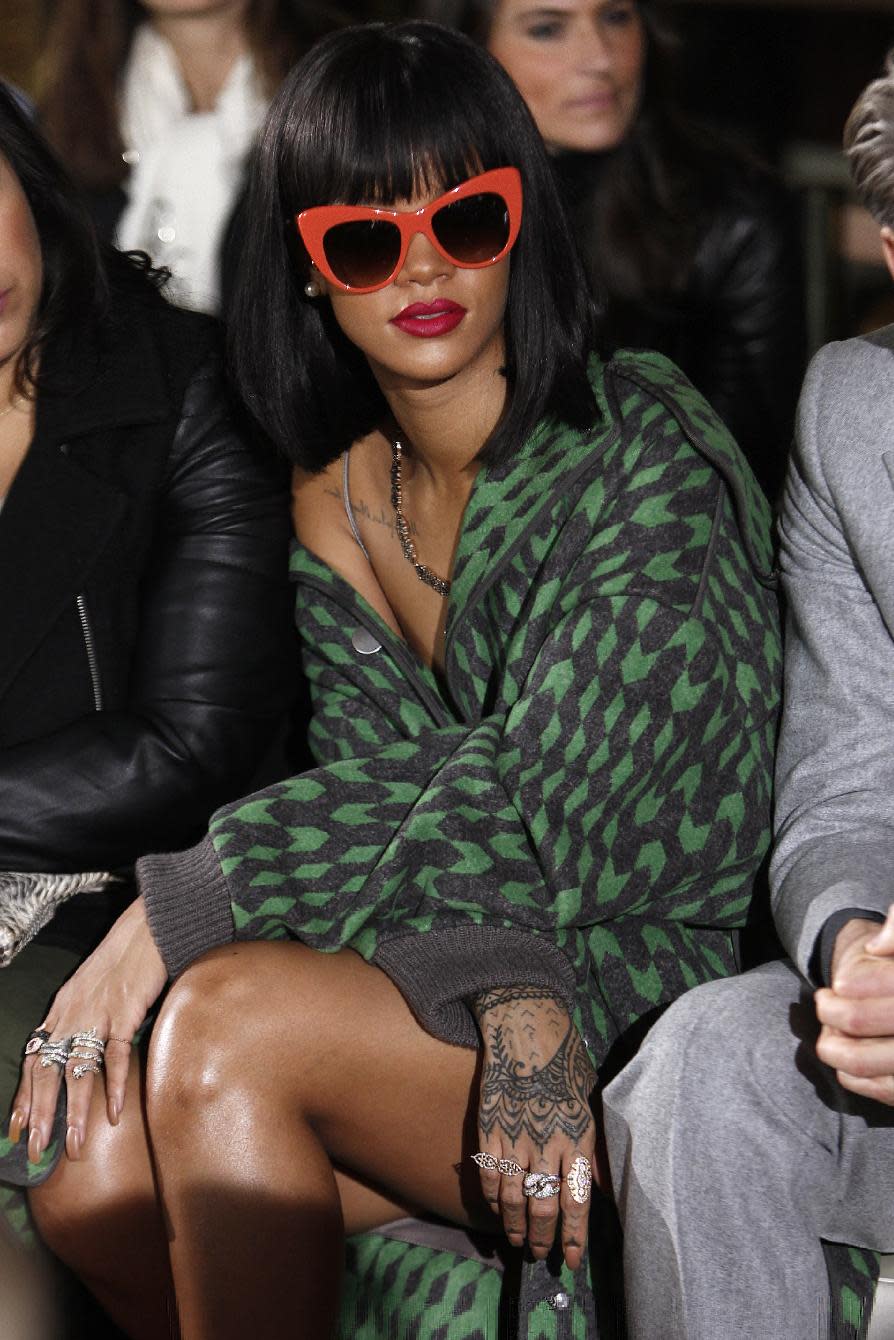 Singer Rihanna attends Stella McCartney's ready-to-wear fall/winter 2014-2015 fashion collection presented in Paris, Monday, March 3, 2014. (AP Photo/Thibault Camus)