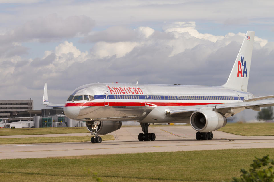 American Airlines Boeing 757 on runway waiting for take off at Manchester Airport