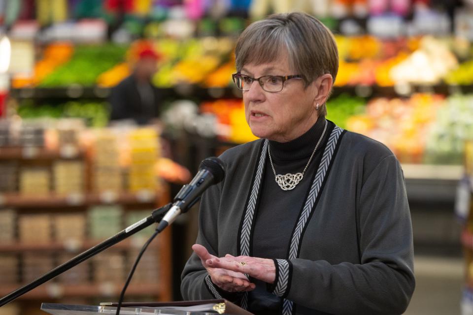 Gov. Laura Kelly presents three proposed tax cuts Monday morning during a news conference at a Price Chopper in Roeland Park.