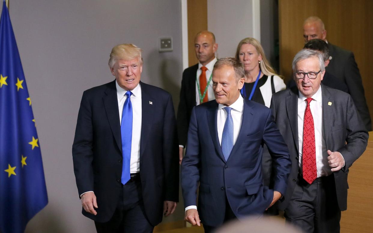 US President Donald J. Trump chats with the President of the European Council, Donald Tusk,  and the President of the European Commission, Jean-Claude Juncker, at the end of their meeting at the European Council, in Brussels, Belgium - EPA