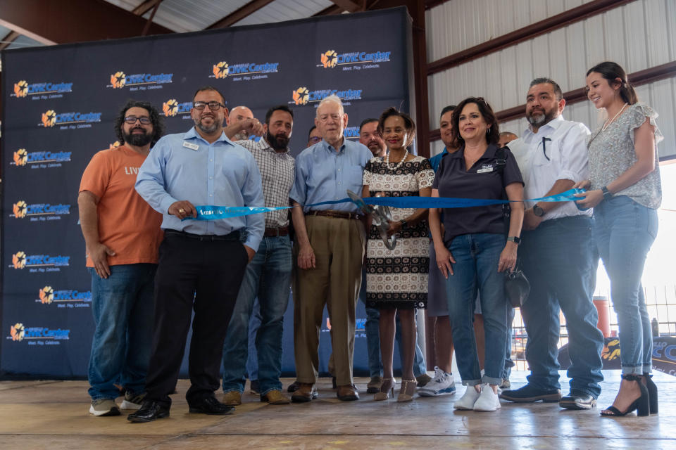 Mayor Cole Stanley and the Hispanic Chamber of Commerce cut the ribbon Friday at the grand opening of the Pavilion at the Santa Fe Depot in downtown Amarillo.
