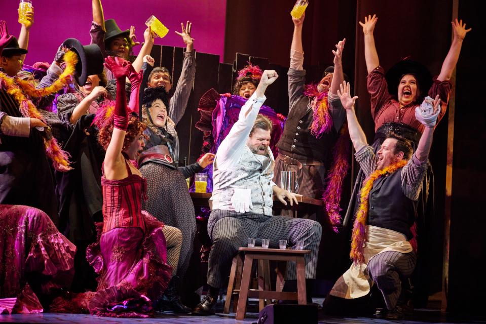 Michael Hegarty (center) as Alfred P. Doolittle and the company of the national tour of "My Fair Lady."