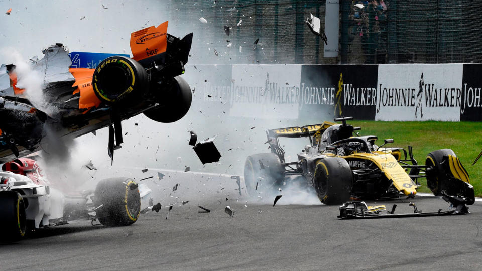 Nico Hulkenberg watches Fernando Alonso fly as a result of his mistake under braking. Pic: Getty