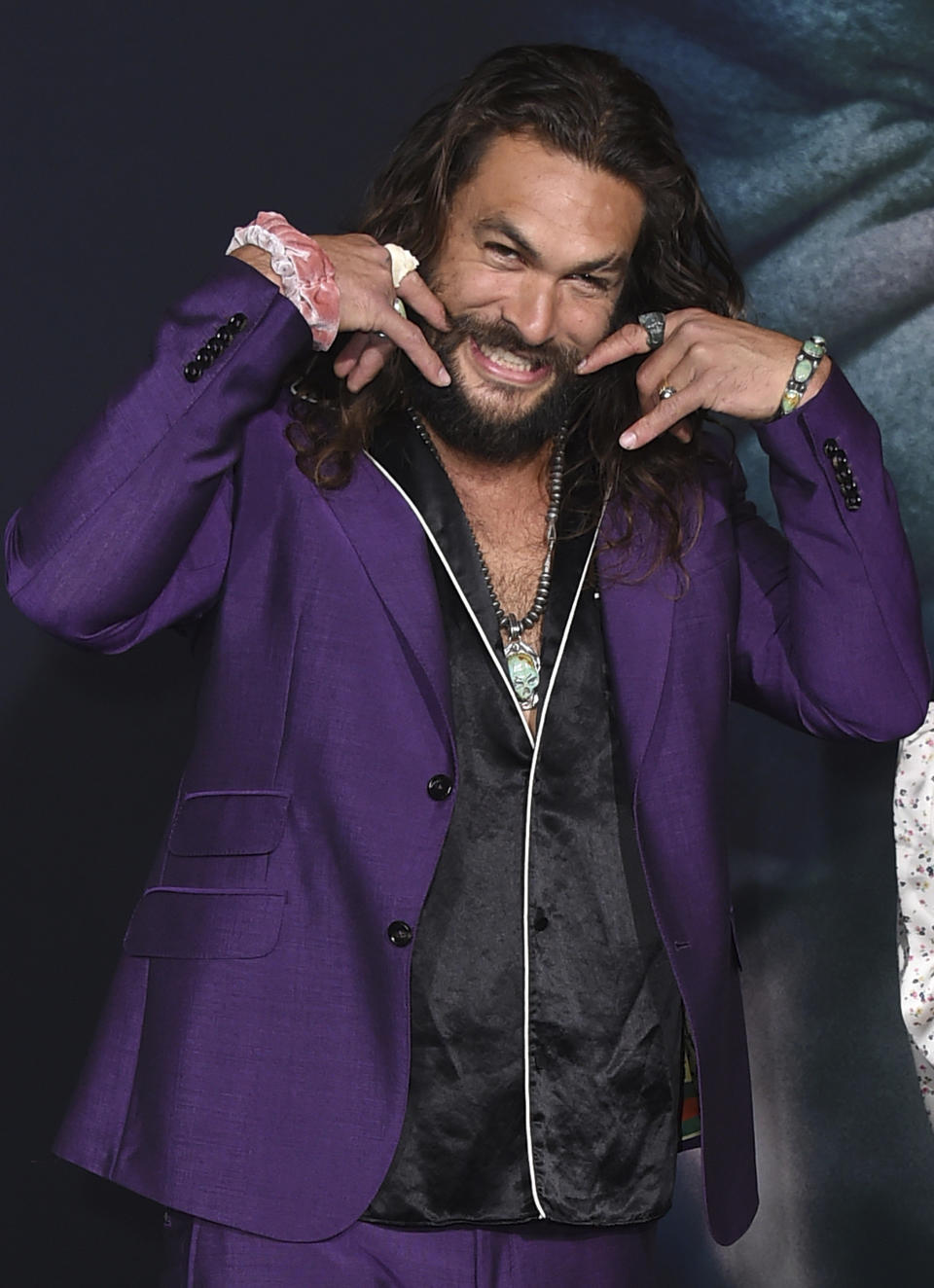 FILE - In this July 21, 2018, file photo, Jason Momoa, left, and Lisa Bonet arrive at the Los Angeles premiere of "Joker." Momoa turns 41 on Aug. 1. (Photo by Jordan Strauss/Invision/AP, File)