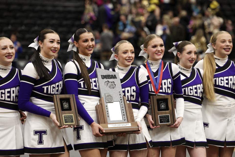 Tabiona High School cheerleaders display their three awards that they earned at the Competitive Cheer Tournament at the UCCU Center at Utah Valley University in Orem on Thursday, Jan. 25, 2023. | Laura Seitz, Deseret News