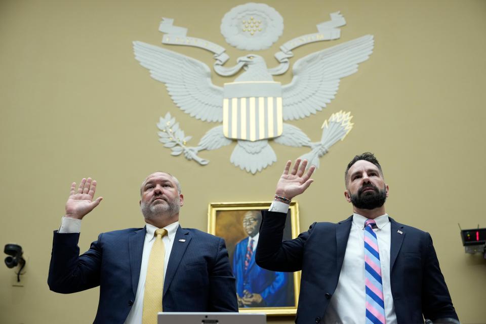 Supervisory IRS Special Agent Gary Shapley (L) and IRS Criminal Investigator Joseph Ziegler are sworn-in as they testify during a House Oversight Committee hearing related to the Justice Department's investigation of Hunter Biden, on Capitol Hill July 19, 2023 in Washington, DC. The committee heard testimony from two whistleblowers from the Internal Revenue Service who allege that the Hunter Biden criminal probe was mishandled by the Department of Justice.