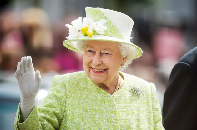 Queen Elizabeth II waves during a walk about around Windsor on her 90th birthday on April 21, 2016 in Windsor, England.  (Photo: Samir Hussein via Getty Images)