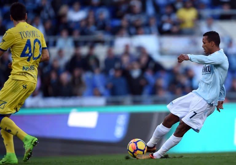 Lazio's forward Luis Nani (R) scores against Chievo at the Olympic Stadium in Rome on January 21, 2018