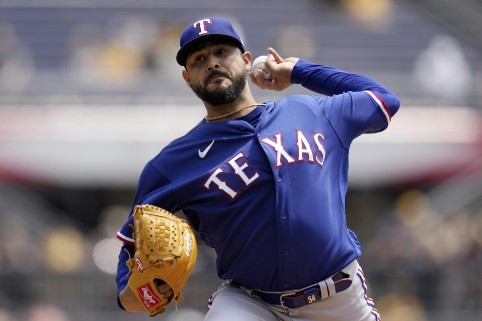 Texas Rangers starting pitcher Martin Perez delivers during the first inning of a baseball game against the Pittsburgh Pirates in Pittsburgh, Wednesday, May 24, 2023. (AP Photo/Gene J. Puskar)