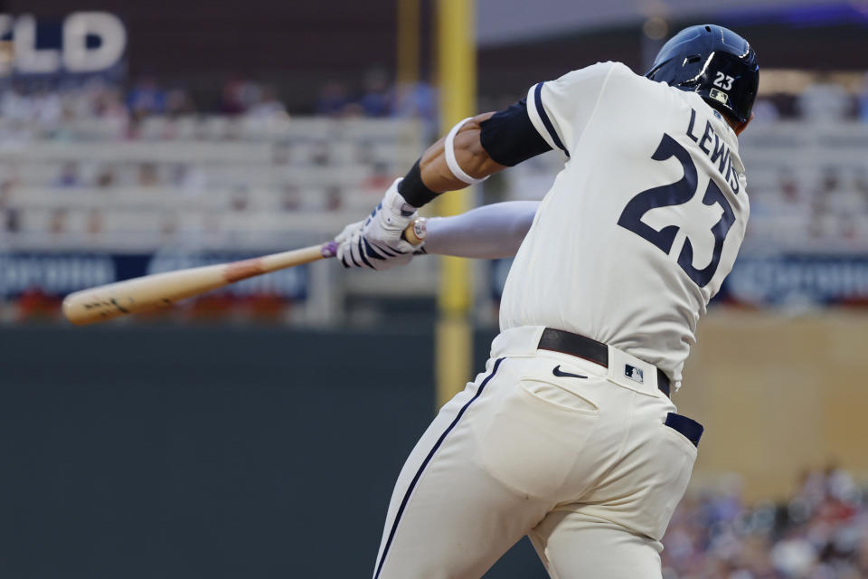 Minnesota Twins' Royce Lewis hits a grand slam against the Cleveland Guardians in the second inning of a baseball game, Monday, Aug. 28, 2023, in Minneapolis. (AP Photo/Bruce Kluckhohn)