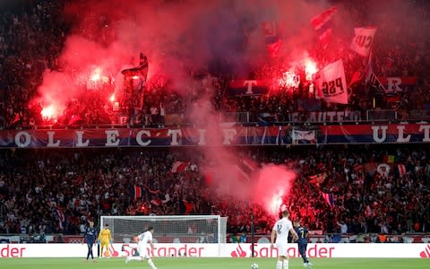  September 18, 2019 General view as Paris St Germain fans let of flares during the match - Credit: REUTERS