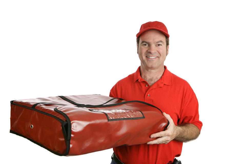 Male in red delivering pizza