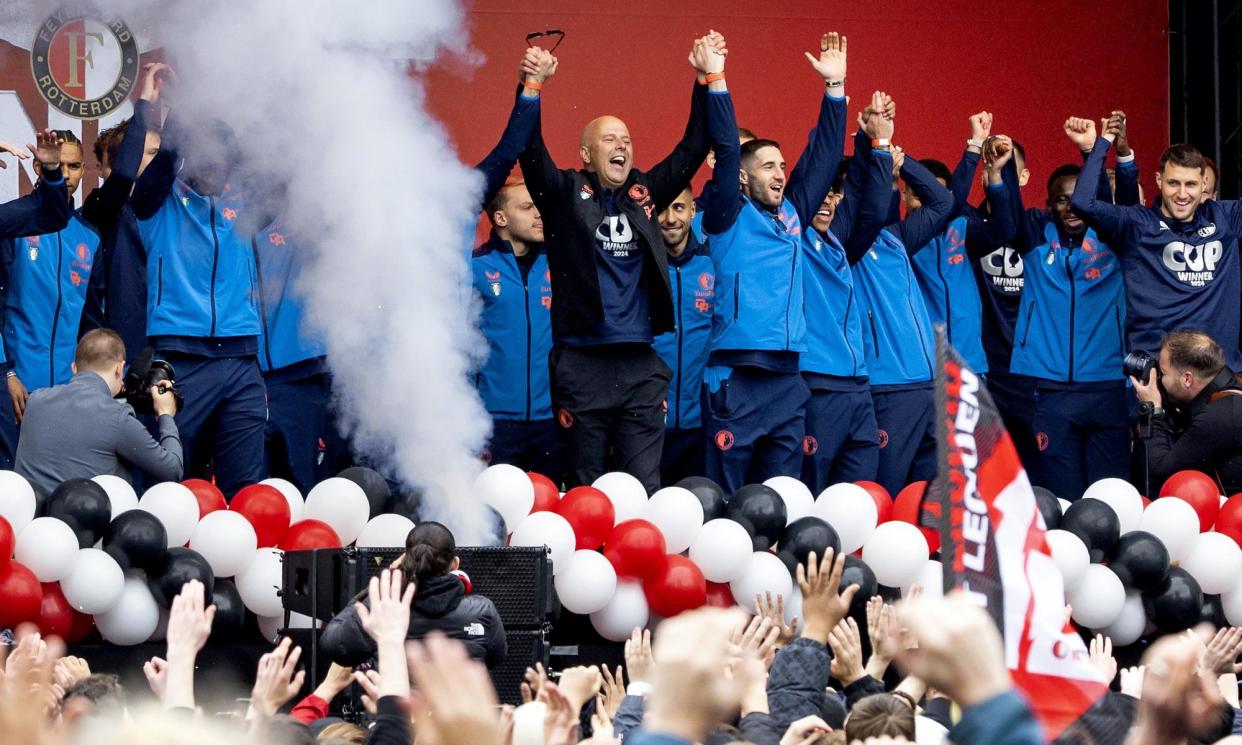 <span>Arne Slot (centre) and the Feyenoord squad celebrate their Dutch Cup success in Rotterdam earlier this week.</span><span>Photograph: Hollandse Hoogte/Shutterstock</span>