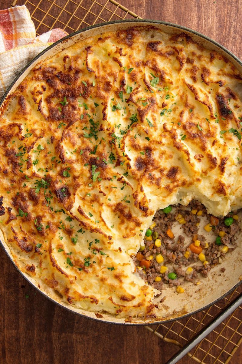 <p>Cottage pie is essentially a shepherd's pie but with beef. It's a meat pie, filled with minced beef and topped with mashed potatoes. YUM. The sauce we use is super simple. We sauté veggies, beef, and thyme, add flour, then simmer the mixture in stock. It tastes amazing, but the best part of the dish is the FLUFFY MASHED POTATO TOPPING.</p><p>Get the <a href="https://www.delish.com/uk/cooking/recipes/a29139632/cottage-pie/" rel="nofollow noopener" target="_blank" data-ylk="slk:Cottage Pie;elm:context_link;itc:0;sec:content-canvas" class="link ">Cottage Pie</a> recipe.</p>