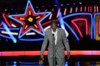 Baltimore Ravens' Lamar Jackson, AP Most valuable player speaks during the NFL Honors award show ahead of the Super Bowl 58 football game Thursday, Feb. 8, 2024, in Las Vegas. The San Francisco 49ers face the Kansas City Chiefs in Super Bowl 58 on Sunday. (AP Photo/David J. Phillip)