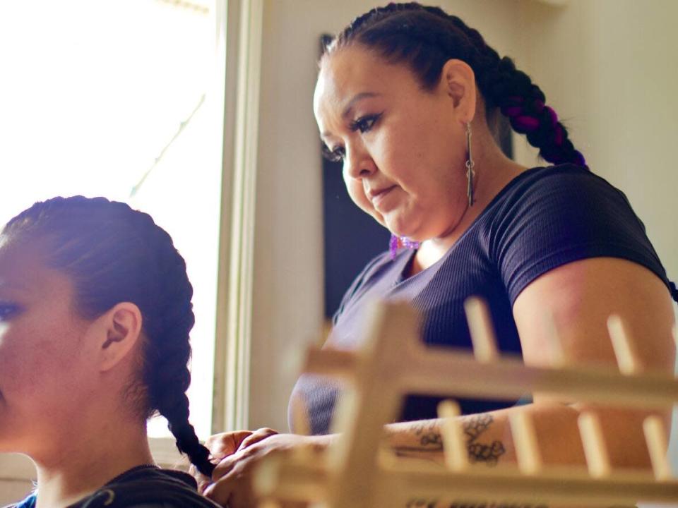 Jenn Jack braids hair for people throughout northern B.C., some of whom travel several hours to procure her services. (Nadia Mansour/CBC - image credit)