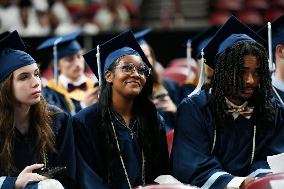 J.L. Mann Class of 2024 graduates watch on during the commencement ceremony at Bon Secours Wellness Arena on Wednesday, May 22, 2024.