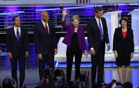 Candidates pose before the start of the first U.S. 2020 presidential election Democratic candidates debate in Miami, Florida, U.S.,