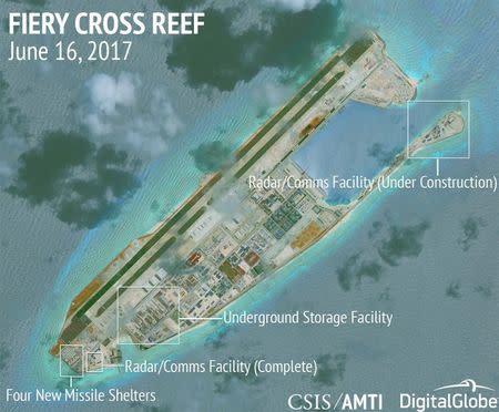 Construction is shown on Fiery Cross Reef, in the Spratly Islands, the disputed South China Sea in this June 16, 2017 satellite image released by CSIS Asia Maritime Transparency Initiative at the Center for Strategic and International Studies (CSIS) to Reuters on June 29, 2017. MANDATORY CREDIT CSIS/AMTI DigitalGlobe/Handout via REUTERS