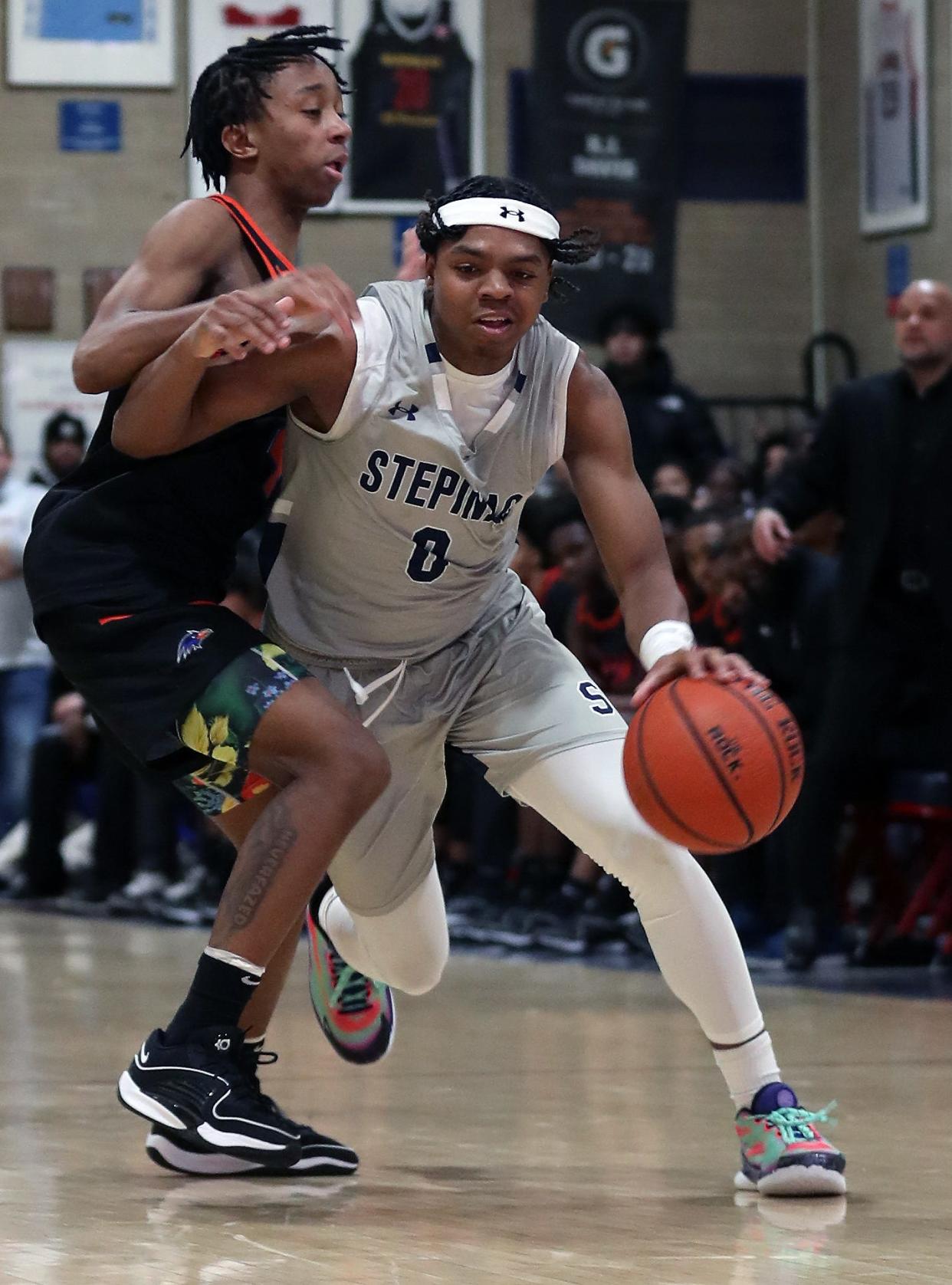 Stepinac's Danny Carbuccia (0) drives to the basket against St. Raymonds during CHSAA basketball action at Archbishop Stepinac High School in White Plains Jan. 19, 2024. Stepinac won the game 100-71.