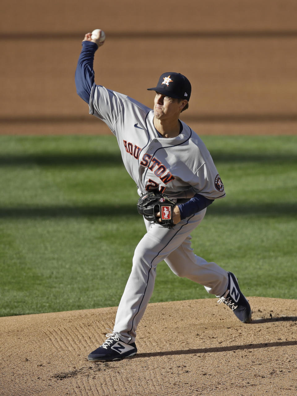 Houston Astros pitcher Zack Greinke works against the Oakland Athletics in the first inning of a baseball game Friday, Aug. 7, 2020, in Oakland, Calif. (AP Photo/Ben Margot)