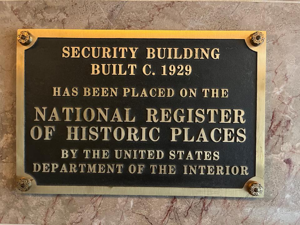 A plaque in the Security Building marks its inclusion on the National Register of Historic Places. The building was added to the register in 1985.