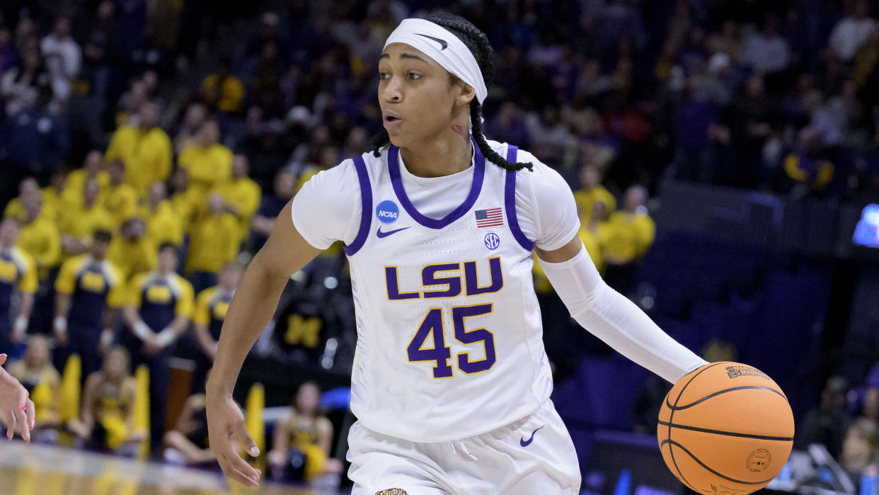 LSU guard Alexis Morris dribbles against Michigan during the second round in the women's NCAA tournament on March 19, 2023. (AP Photo/Matthew Hinton)