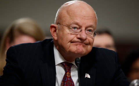 Director of National Intelligence James Clapper testifies on Capitol Hill in Washington, Thursday, Jan. 5, 2017, before the Senate Armed Services Committee hearing: "Foreign Cyber Threats to the United States." - Credit: AP