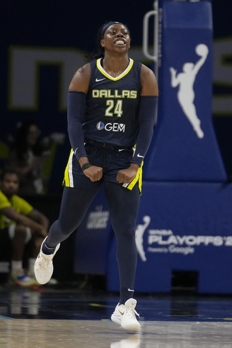 Dallas Wings guard Arike Ogunbowale celebrates after sinking a basket in the first half of Game 2 of a first-round WNBA basketball playoff series against the Atlanta Dream, Tuesday, Sept. 19, 2023, in Arlington, Texas. (AP Photo/Tony Gutierrez)