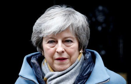FILE PHOTO: British Prime Minister Theresa May walks outside Downing Street, as she faces a vote on Brexit, in London, Britain March 13, 2019. REUTERS/Henry Nicholls/File Photo