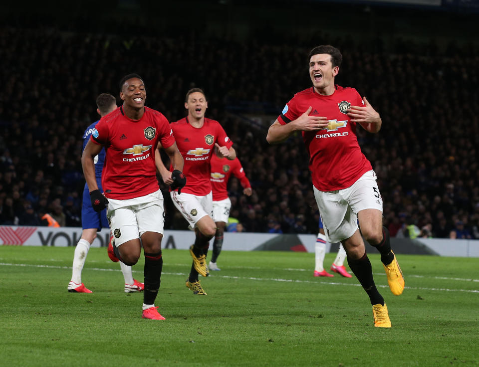 Harry Maguire of Manchester United celebrates scoring their second goal during the Premier League match between Chelsea FC and Manchester United at Stamford Bridge on February 17, 2020 in London, United Kingdom.