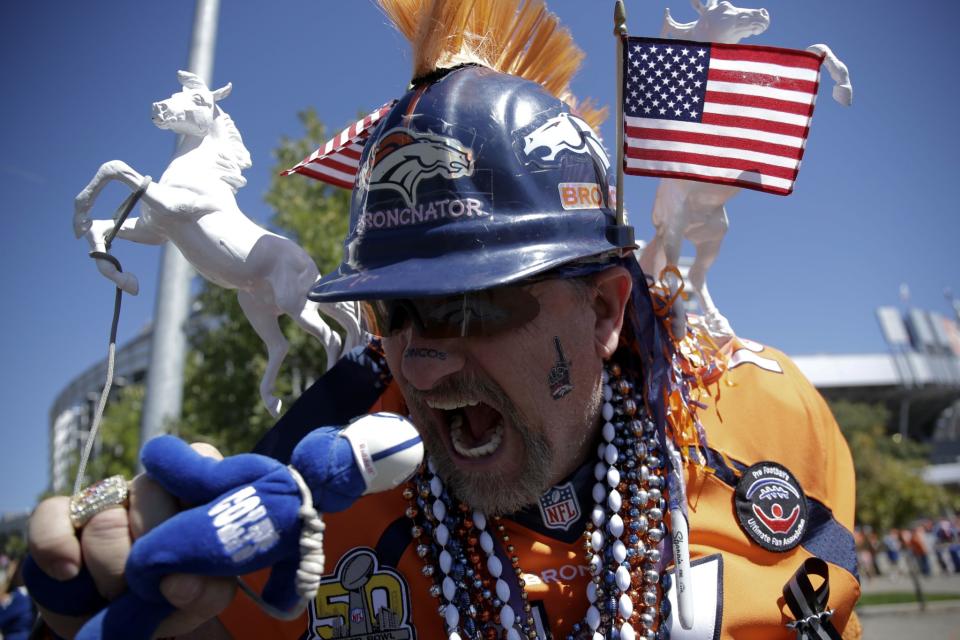 <p>A Denver Broncos fan poses outside Sports Authority Field at Mile High before a NFL football game between the Broncos and the Indianapolis Colts, Sunday, Sept. 18, 2016, in Denver. (AP Photo/Jack Dempsey) </p>