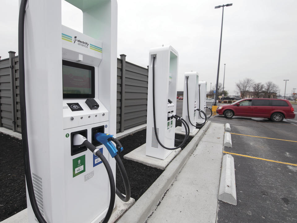 FILE - Electrify America, an electric car charger producer, has opened a charging station Wednesday, Jan. 16, 2019, in Paducah, Ky. German engineering company Siemens is making an investment in Electrify America, a Volkswagen division that includes a network of electric vehicle charging stations in North America. Electrify America said Tuesday, June 28, 2022, that Siemens is its first outside investor and will have a board seat. Siemens will contribute a low triple-digit million dollar amount, with media reports pegging it at more than $100 million. (Ellen O'Nan/The Paducah Sun via AP, File)