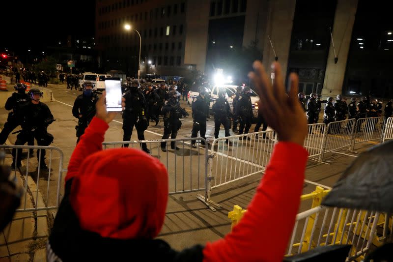 Demonstrators take part in a protest in Rochester, New York