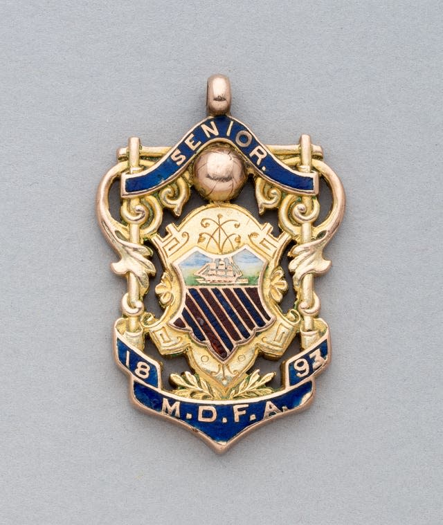 The earliest Manchester United football medal, when the club was known as Newton Heath, sold for £24,100 (Graham Budd Auctions)