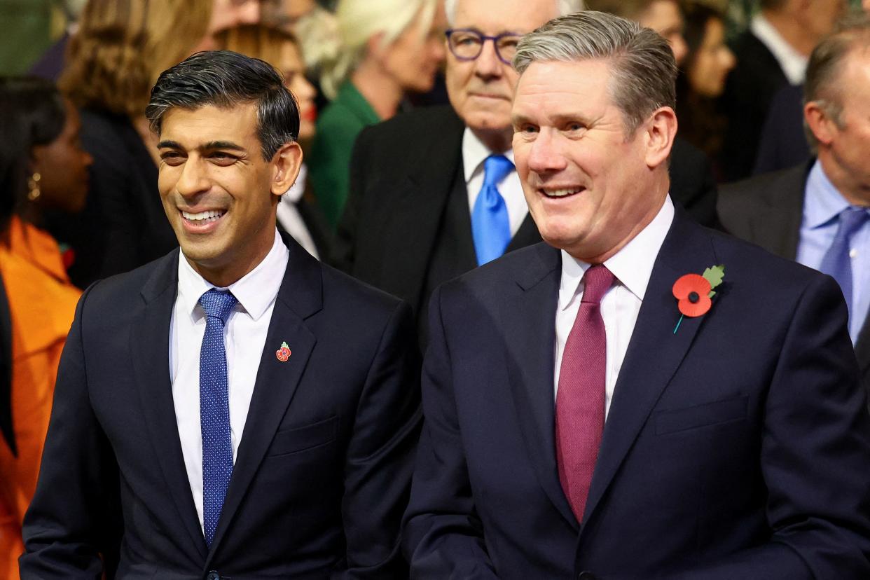 Britain's Prime Minister Rishi Sunak and Britain's main opposition Labour Party leader Keir Starmer arrive to the House of Commons Members' Lobby during the State Opening of Parliament at the Houses of Parliament in London on November 7, 2023. (Photo by HANNAH MCKAY / POOL / AFP) (Photo by HANNAH MCKAY/POOL/AFP via Getty Images)