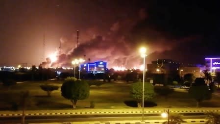 Smoke is seen following a fire at an Aramco factory in Abqaiq