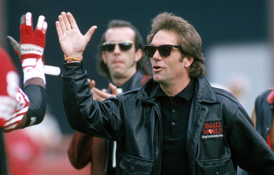 Huey Lewis & The News perform the national anthem before a New York Giants-San Francisco 49ers playoff game in 1991 in San Francisco.