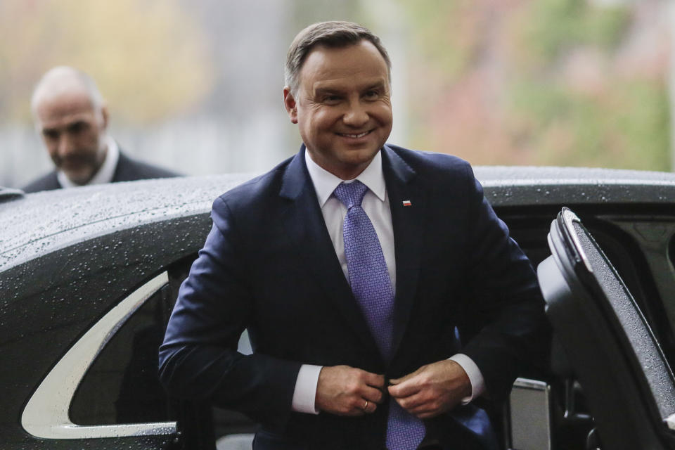 President of Poland Andrzej Duda arrives for a meeting with German Chancellor Angela Merkel at the chancellery in Berlin, Tuesday, Oct. 23, 2018. (AP Photo/Markus Schreiber)