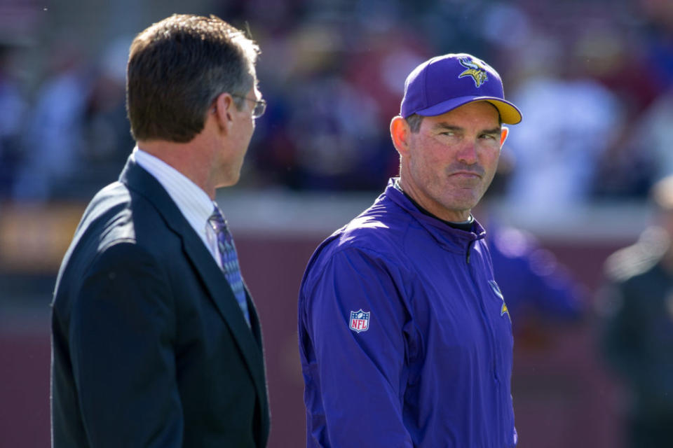 Oct 18, 2015; Minneapolis, MN, USA; Minnesota Vikings head coach Mike Zimmer speaks, right, with general manager Rick Spielman before the game with the Kansas City Chiefs at TCF Bank Stadium. The Vikings win 16-10. Mandatory Credit: Bruce Kluckhohn-USA TODAY Sports