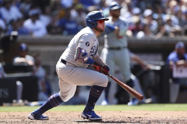 Dodgers 1st team to clinch a playoff spot, rout Padres 11-2