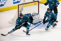 May 25, 2016; San Jose, CA, USA; San Jose Sharks right wing Joonas Donskoi (27) and center Logan Couture (39) defend the goal in the third period of game six in the Western Conference Final of the 2016 Stanley Cup Playoffs at SAP Center at San Jose. The Sharks won 5-2. Mandatory Credit: John Hefti-USA TODAY Sports