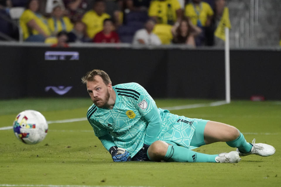 Nashville SC goalkeeper Joe Willis watches as a shot by the Seattle Sounders goes wide of the net during the second half of an MLS soccer match Wednesday, July 13, 2022, in Nashville, Tenn. (AP Photo/Mark Humphrey)