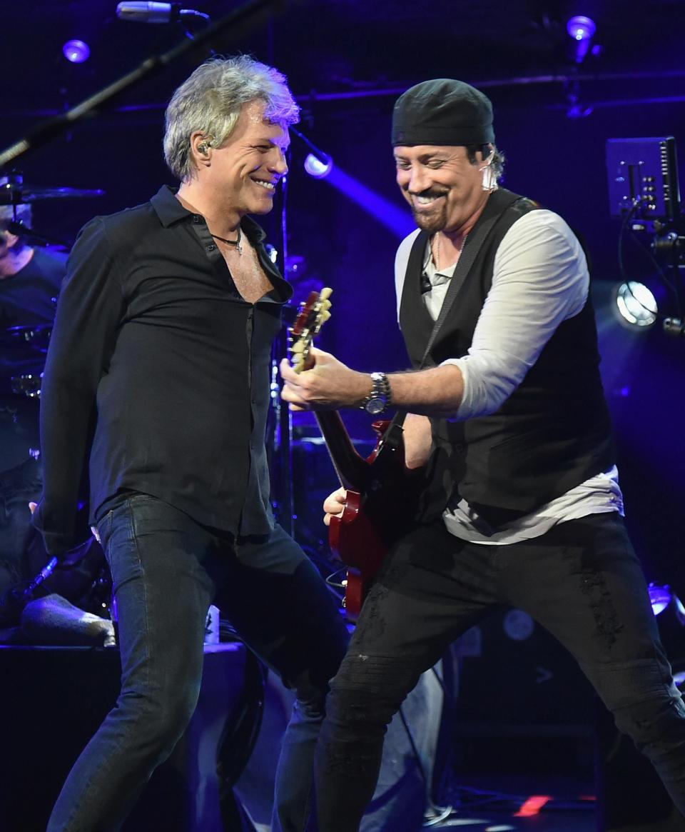 Jon Bon Jovi (left) and John Shanks perform during the final Tidal X live listening party for the group’s album “This House is Not for Sale” on Oct. 20, 2016, at the Barrymore Theatre in New York City.