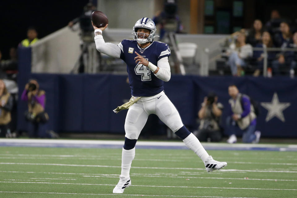 Dallas Cowboys quarterback Dak Prescott throws a pass during the first half of the team's NFL football game against the Minnesota Vikings in Arlington, Texas, Sunday, Nov. 10, 2019. (AP Photo/Ron Jenkins)