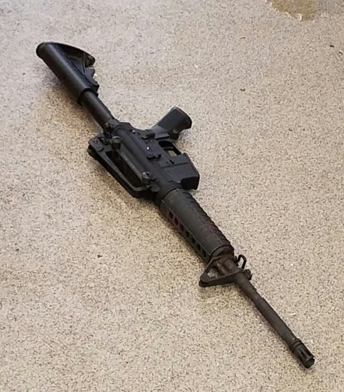 Police say this rifle was used in the semi-nude gunman's deadly shooting