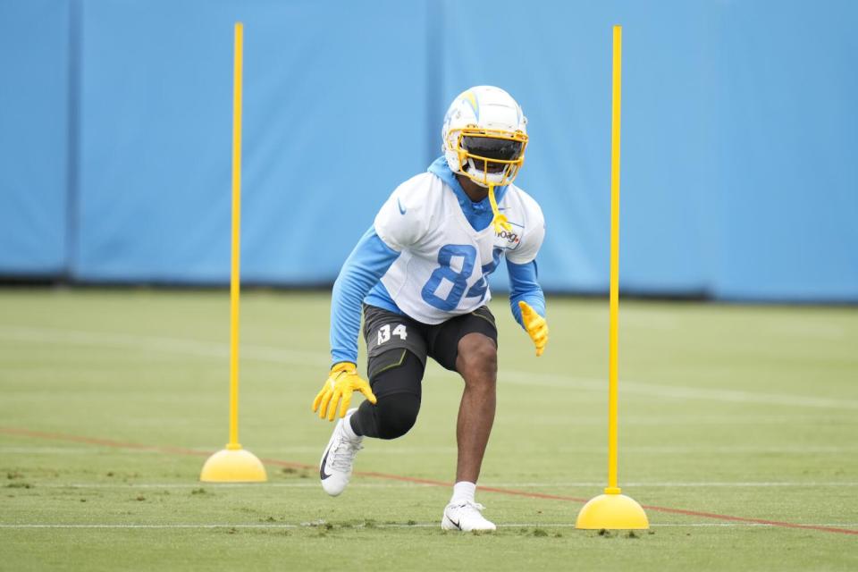 Chargers wide receiver John Hightower runs a drill during practice in May.