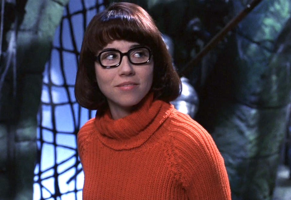 Linda Cardellini as Velma Dinkley in turtleneck and glasses