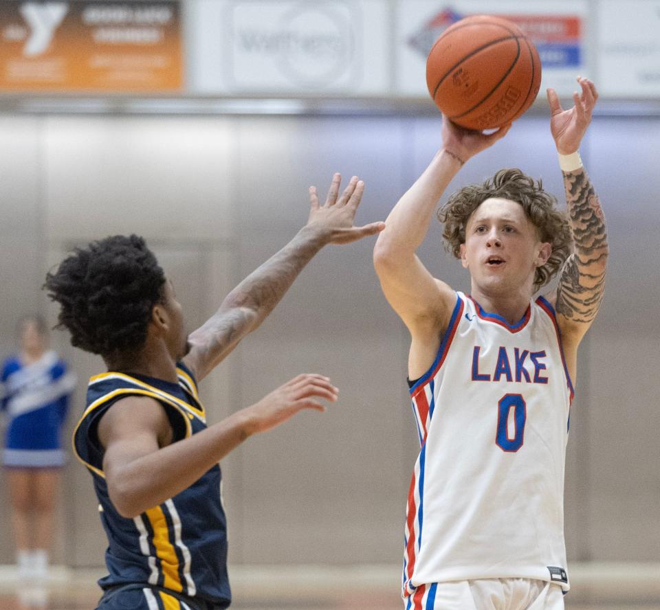 Lake's Chance Casenhiser, shooting a 3-pointer earlier this season, set the school's career scoring record Friday.