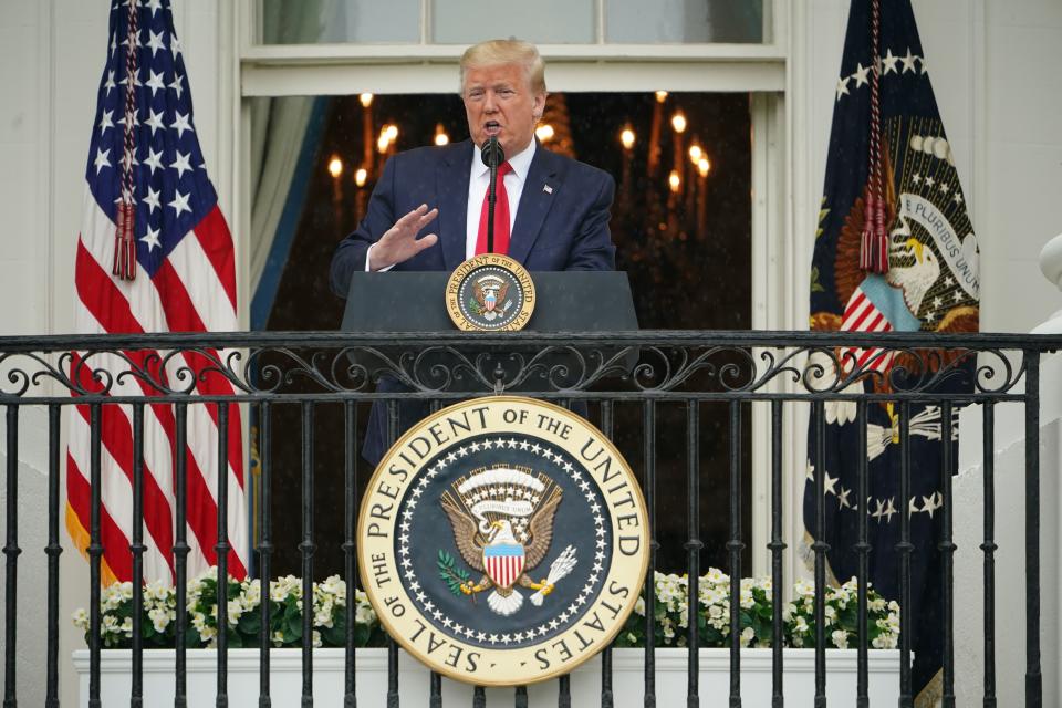 President Trump speaks from the Truman Balcony at the White House. (Mandel Ngan/AFP via Getty Images)